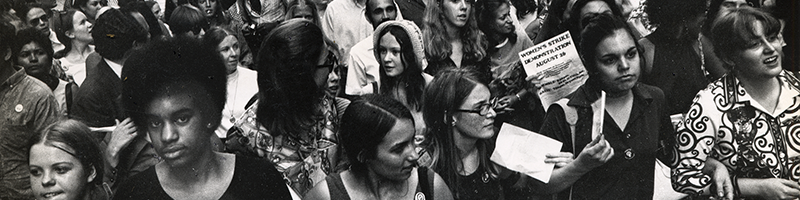 Black and white image of protesters in a city